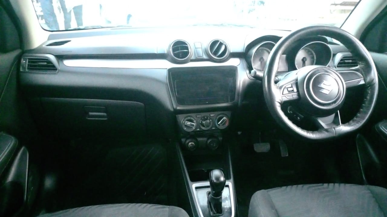 Maruti Suzuki-Swift Vxi – White